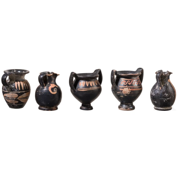 19 miniature vessels made of black-ground glossy earthenware, southern Italy, 4th&ndash;3rd centuries B.C.