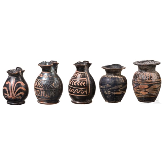 19 miniature vessels made of black-ground glossy earthenware, southern Italy, 4th&ndash;3rd centuries B.C.
