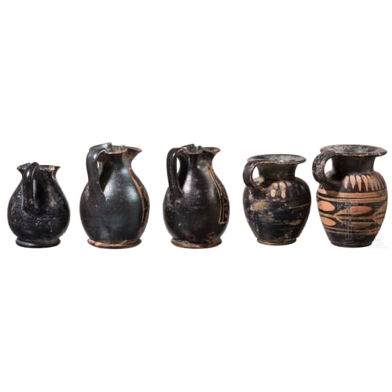19 miniature vessels made of black-ground glossy earthenware, southern Italy, 4th&ndash;3rd centuries B.C.