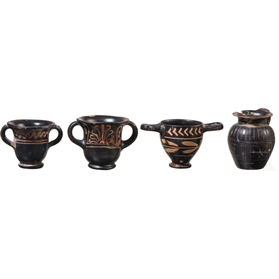 19 miniature vessels made of black-ground glossy earthenware, southern Italy, 4th&ndash;3rd centuries B.C.