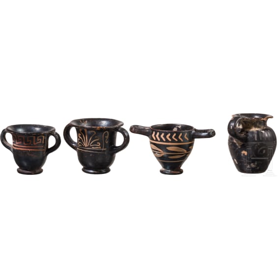 19 miniature vessels made of black-ground glossy earthenware, southern Italy, 4th&ndash;3rd centuries B.C.