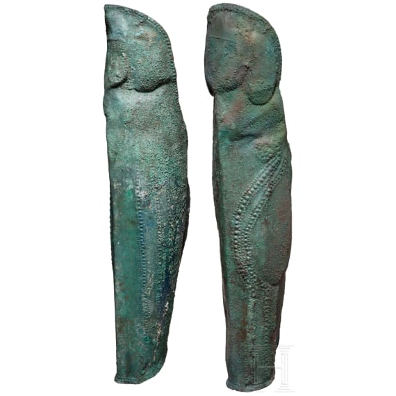 Two anatomically shaped greaves with dotted-and-knobbed decoration, from southern Italy, 5th&ndash;4th centuries B.C.
