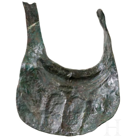 Two South Italian ornate peytrals for horses of a two-horse chariot, plus a simple breastplate, 5th &ndash; 4th century B.C.