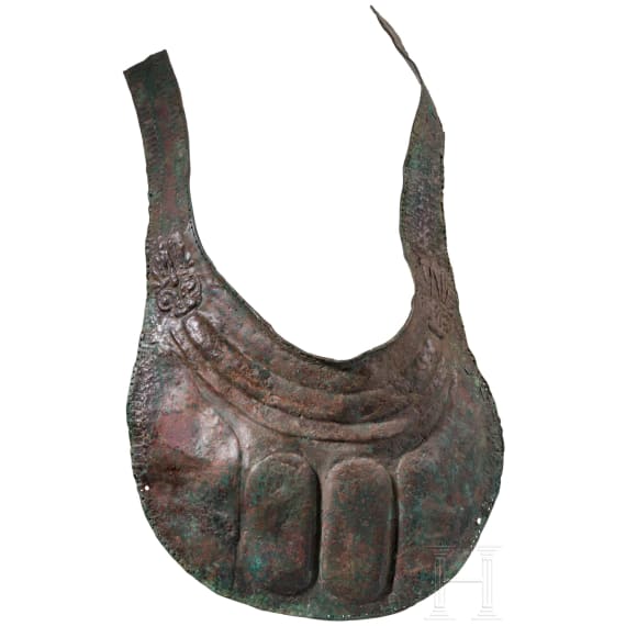 Two South Italian ornate peytrals for horses of a two-horse chariot, plus a simple breastplate, 5th &ndash; 4th century B.C.