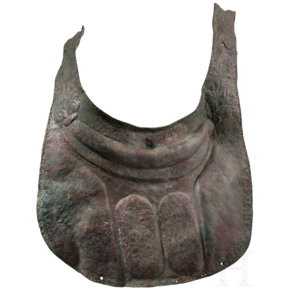 Two South Italian ornate peytrals for horses of a two-horse chariot, plus a simple breastplate, 5th &ndash; 4th century B.C.