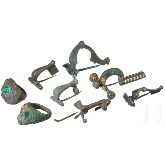 Six Roman bronze brooches and two bronze rings, 1st&ndash;4th centuries A.D.