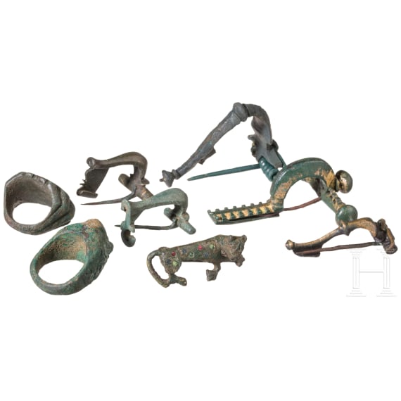 Six Roman bronze brooches and two bronze rings, 1st&ndash;4th centuries A.D.