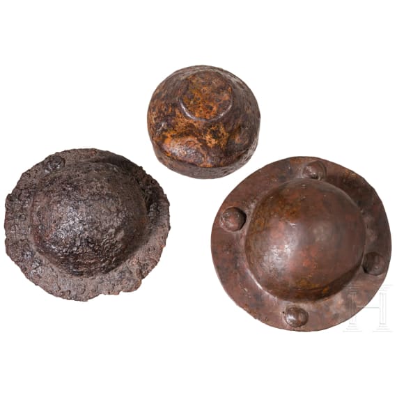 Two iron shield bosses and an iron cladding, 6th century A.D.