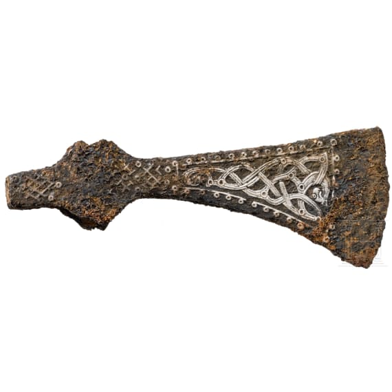 A Viking battle axe made of iron with silver inlays in the Jelling style, 10th century