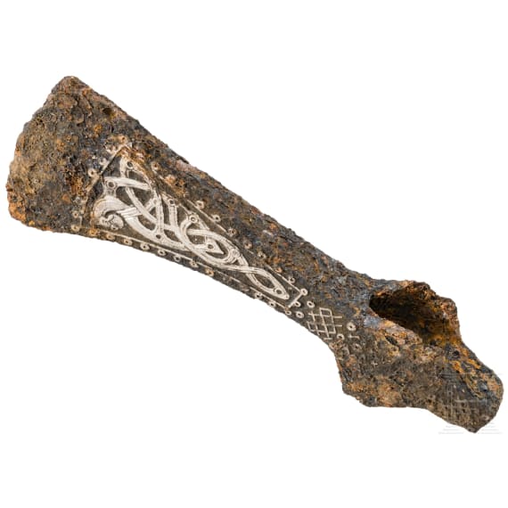 A Viking battle axe made of iron with silver inlays in the Jelling style, 10th century
