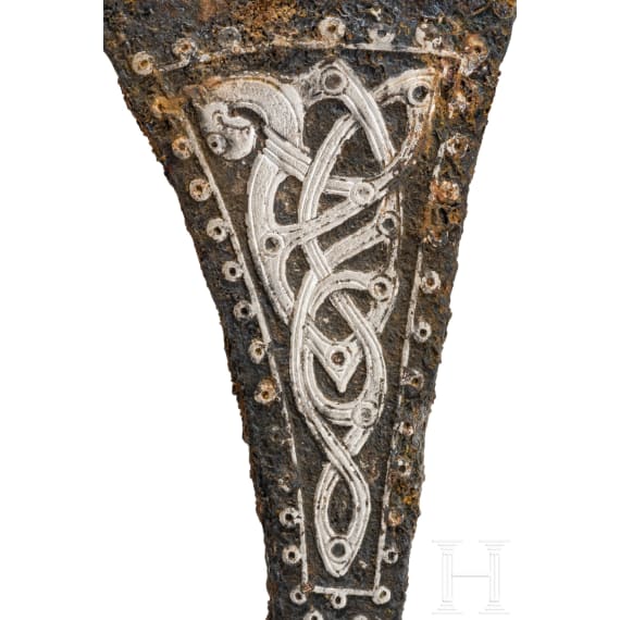 A Viking battle axe made of iron with silver inlays in the Jelling style, 10th century