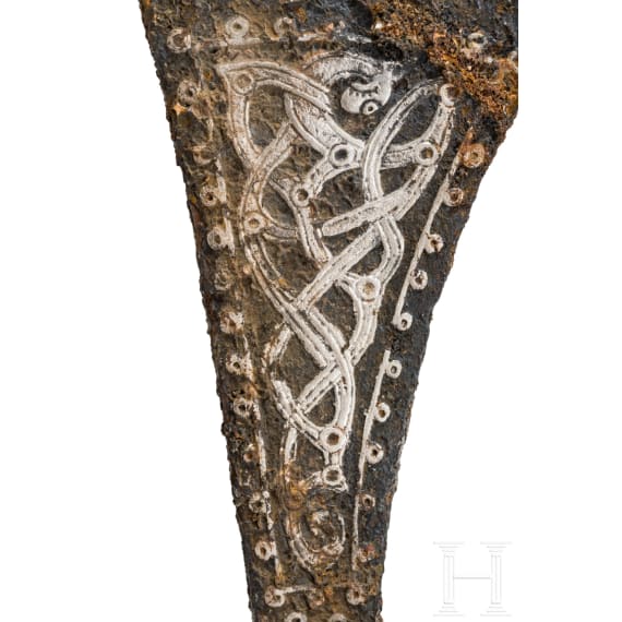 A Viking battle axe made of iron with silver inlays in the Jelling style, 10th century