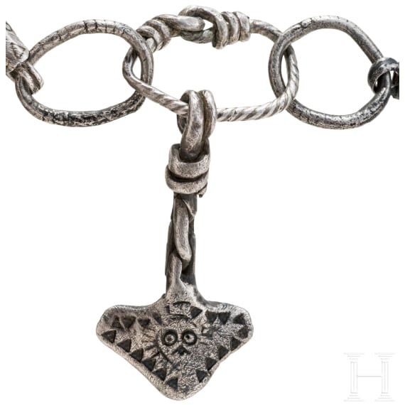 Ornate Thor&rsquo;s hammer on a solid silver foxtail chain, Viking, 10th century.