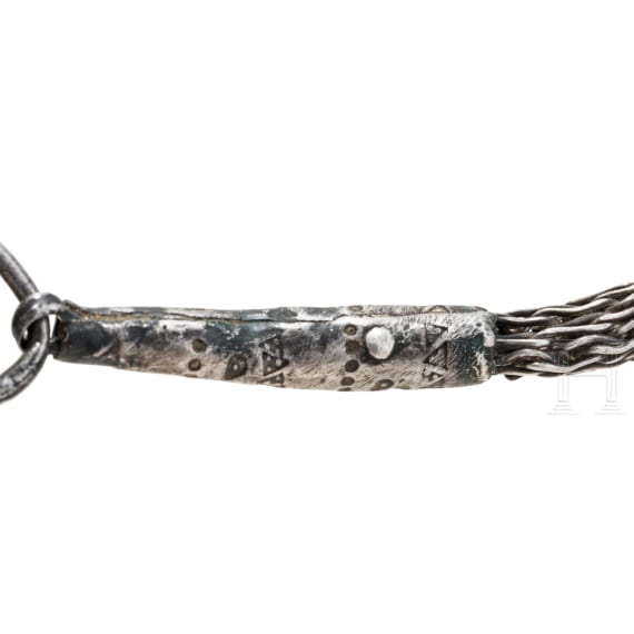 Ornate Thor&rsquo;s hammer on a solid silver foxtail chain, Viking, 10th century.