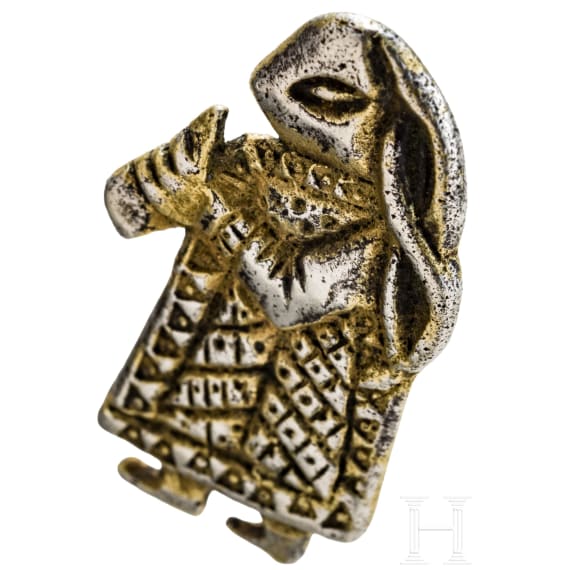 Gold-plated silver pendant in the shape of a Valkyrie with a drinking horn, Viking, 10th century.