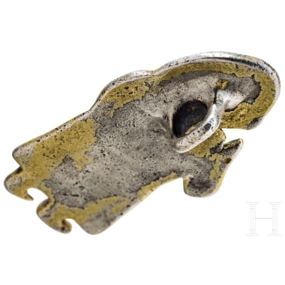 Gold-plated silver pendant in the shape of a Valkyrie with a drinking horn, Viking, 10th century.