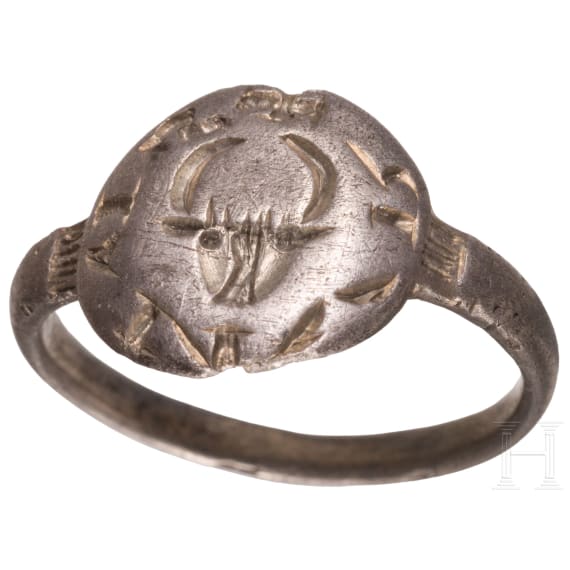 Late Medieval silver ring with a bull's head and inscription, Southeastern Europe, 13th&ndash;14th centuries