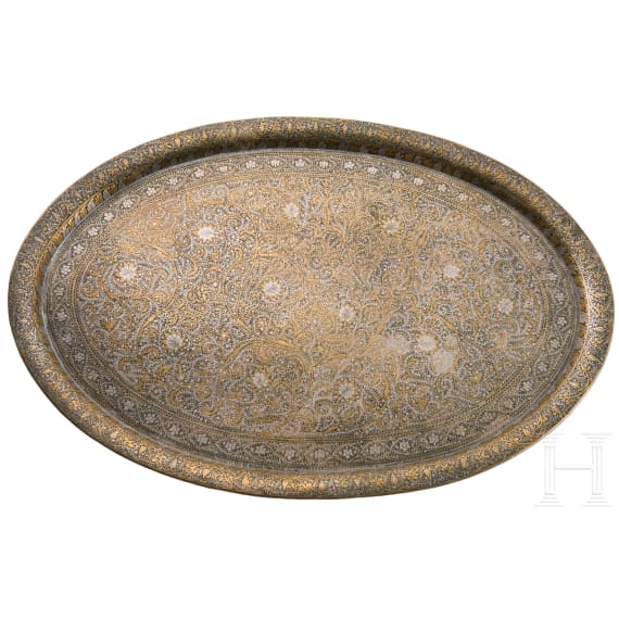 An oval tray with chased d&eacute;cor, India, Lahore, 19th century