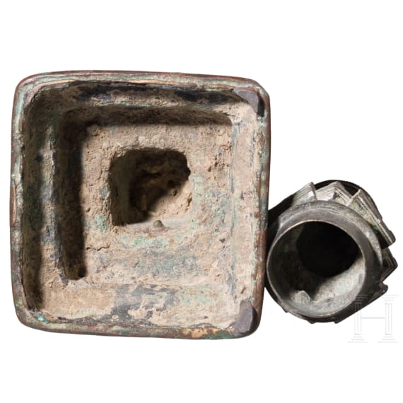 Bronze votive stupa with a reliquary chamber and depictions of Shakyamuni Buddha, flanked by two worshippers. Pagan Kingdom (Myanmar), 12th &ndash; 13th centuries.