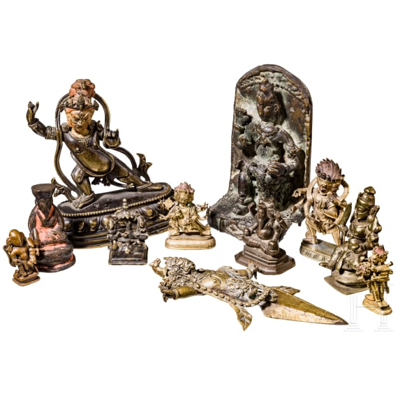 A group of eleven figures and ritual objects, probably from Tibet, Nepal and India, 19th/20th century