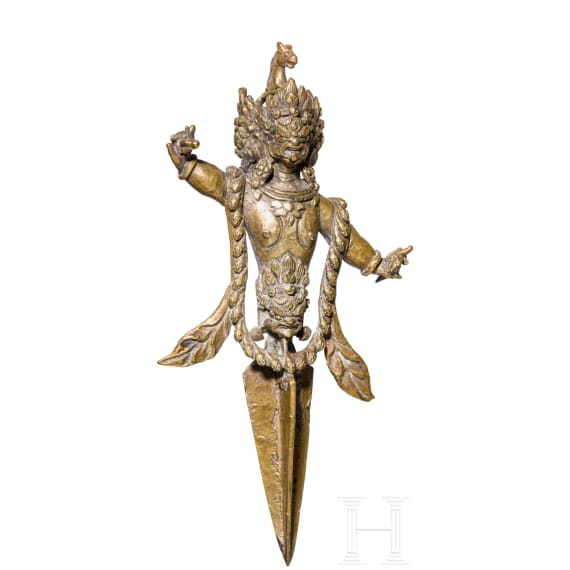 A group of eleven figures and ritual objects, probably from Tibet, Nepal and India, 19th/20th century
