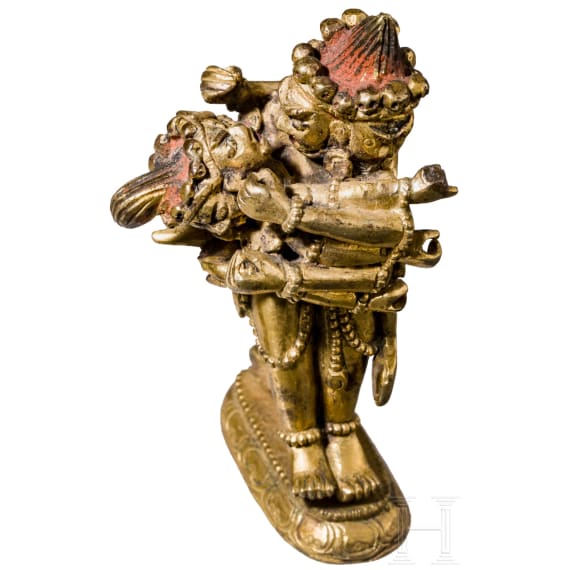 A group of eleven figures and ritual objects, probably from Tibet, Nepal and India, 19th/20th century