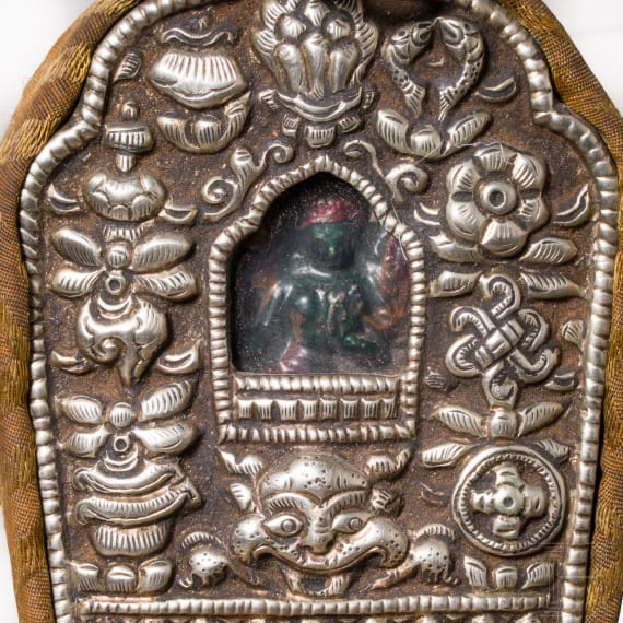 A Tibetan ritual bowl (kapala) and a small travelling altar (Gau), 20th century