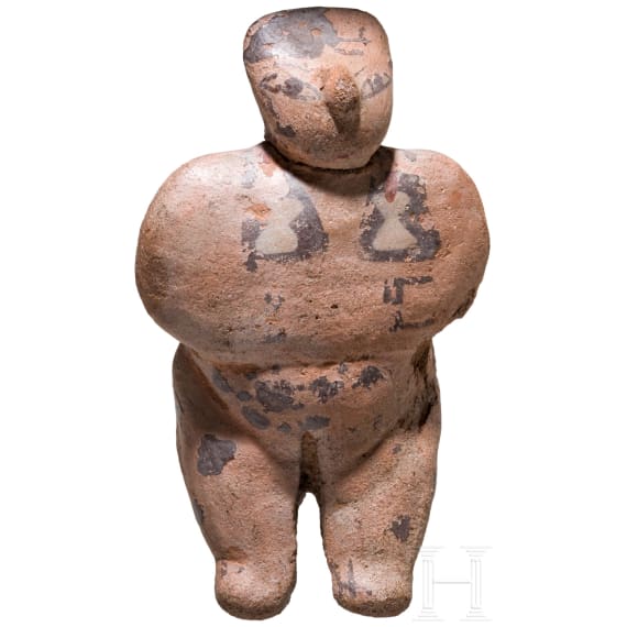A Pre-Columbian clay figure, Peru, probably Nazca, 3rd - 8th century