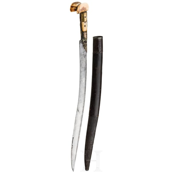 An Ottoman yatagan with coral set hilt, 19th century