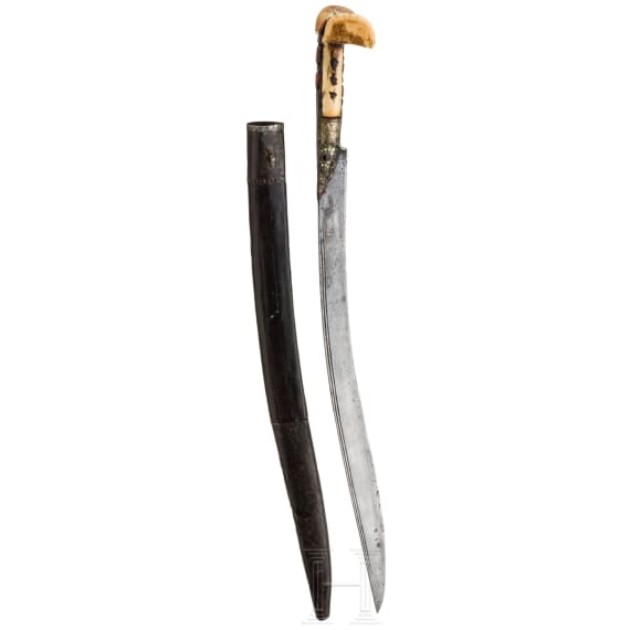An Ottoman yatagan with coral set hilt, 19th century
