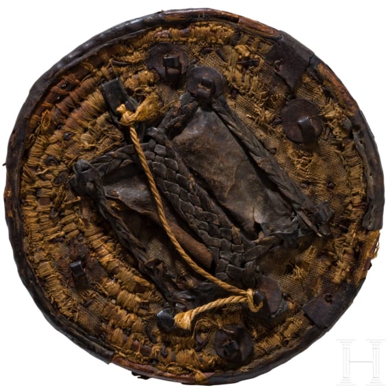 A Caucasian coin-inlaid fist shield, 19th century