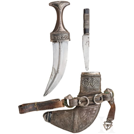 A silver mounted Oman jambiya with rhino horn hilt, ca. 1900