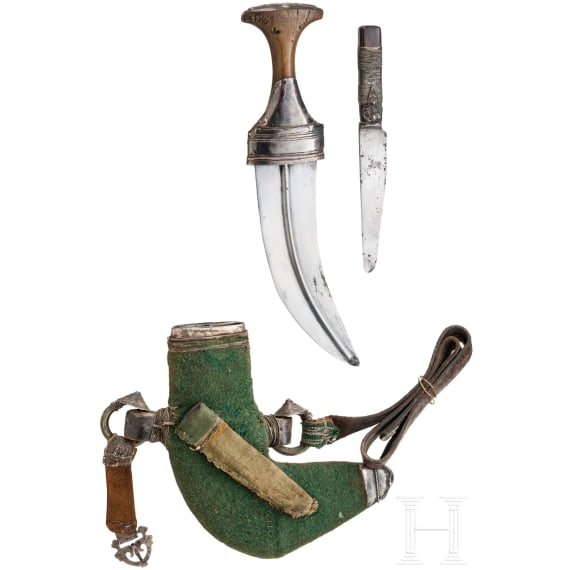 A silver mounted Oman jambiya with rhino horn hilt, ca. 1900