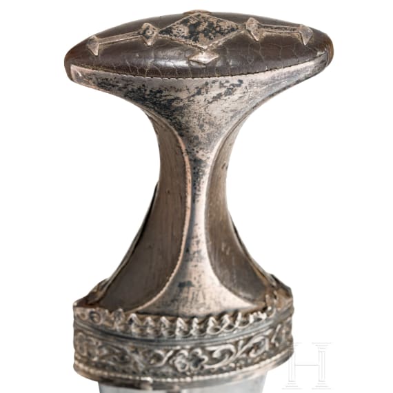 A silver mounted Oman jambiya with rhino horn hilt, ca. 1900