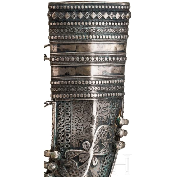 A Yemenite silver-mounted jambiya with rhino horn grip, dated 1942