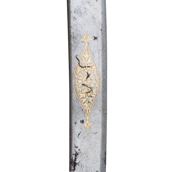 An Indian gold-damascened shamshir with horse head hilt, 19th century