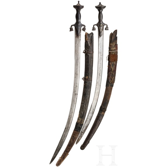 Two Afghan pulwars with scabbards, 19th century