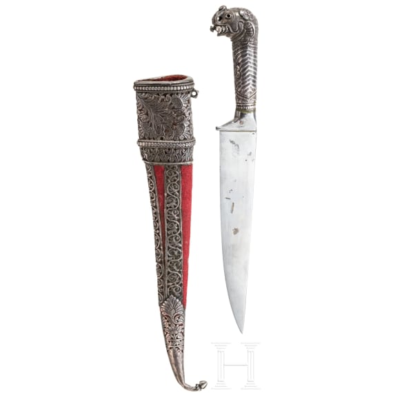 An Indian silver-mounted kard with an elephant-head pommel, 19th century