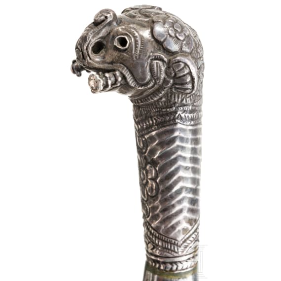 An Indian silver-mounted kard with an elephant-head pommel, 19th century