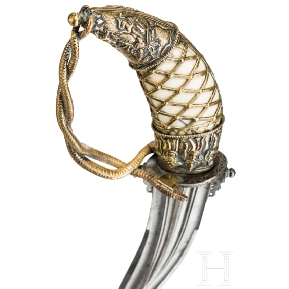 An Indian kanjarli with tiger tooth handle, 18th century