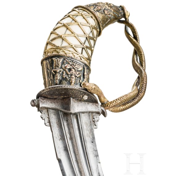 An Indian kanjarli with tiger tooth handle, 18th century