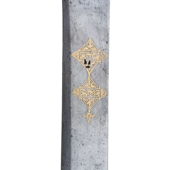 An Indian gold-damascened shamshir with horse head hilt, 19th century