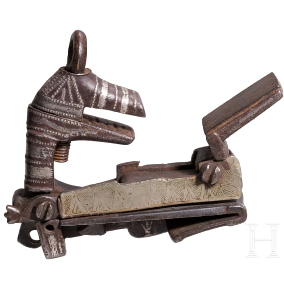 An Ottoman miquelet lock together with a north African Tuareg axe, 19th/20th century