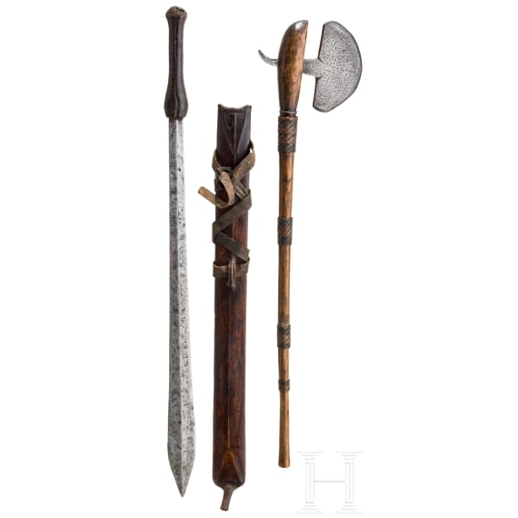 A Masai sword (Ol Alem) and a Sotho battle-axe, Africa, 19th century.