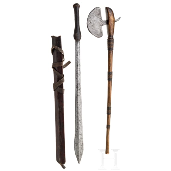 A Masai sword (Ol Alem) and a Sotho battle-axe, Africa, 19th century.