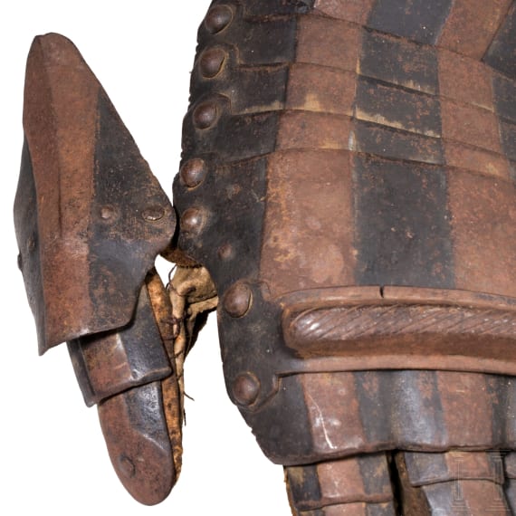 A pair of German black-and-white armoured gauntlets retaining their authentic Leather lining, ca. 1580