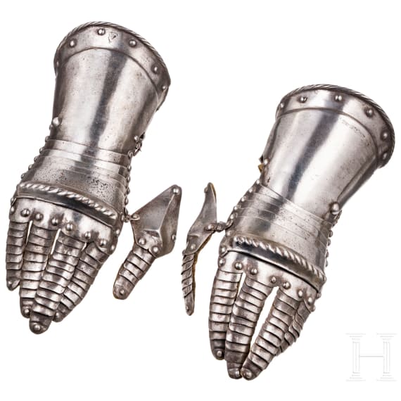 A pair of German armoured gauntlets, circa 1600