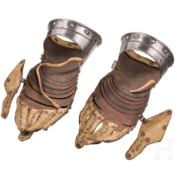 A pair of German armoured gauntlets, circa 1600