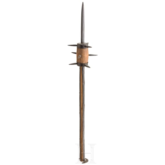 A short South German flail with a cylindrical head, 16th/17th century.