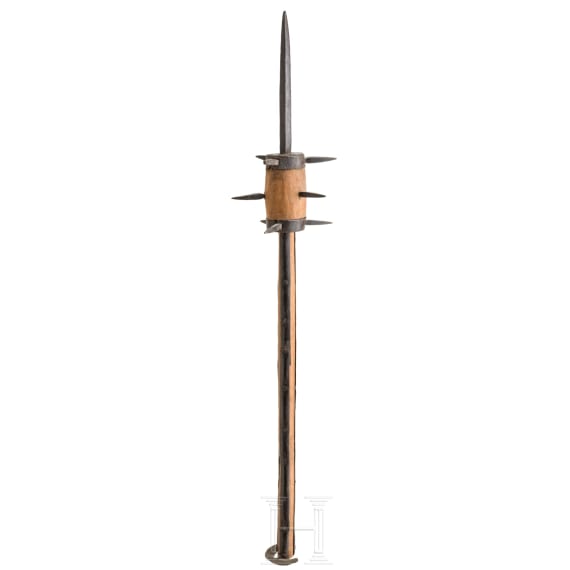 A short South German flail with a cylindrical head, 16th/17th century.